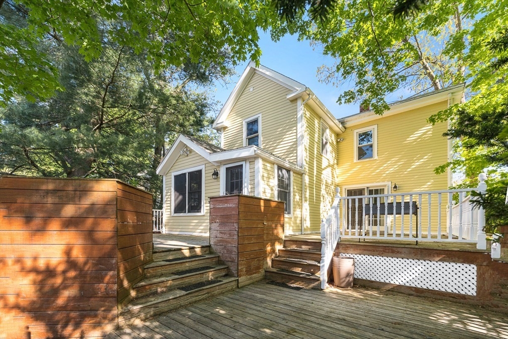 53 Lake Street Winchester, MA 01890 - Photo 29 of 36 a view of a house with a yard