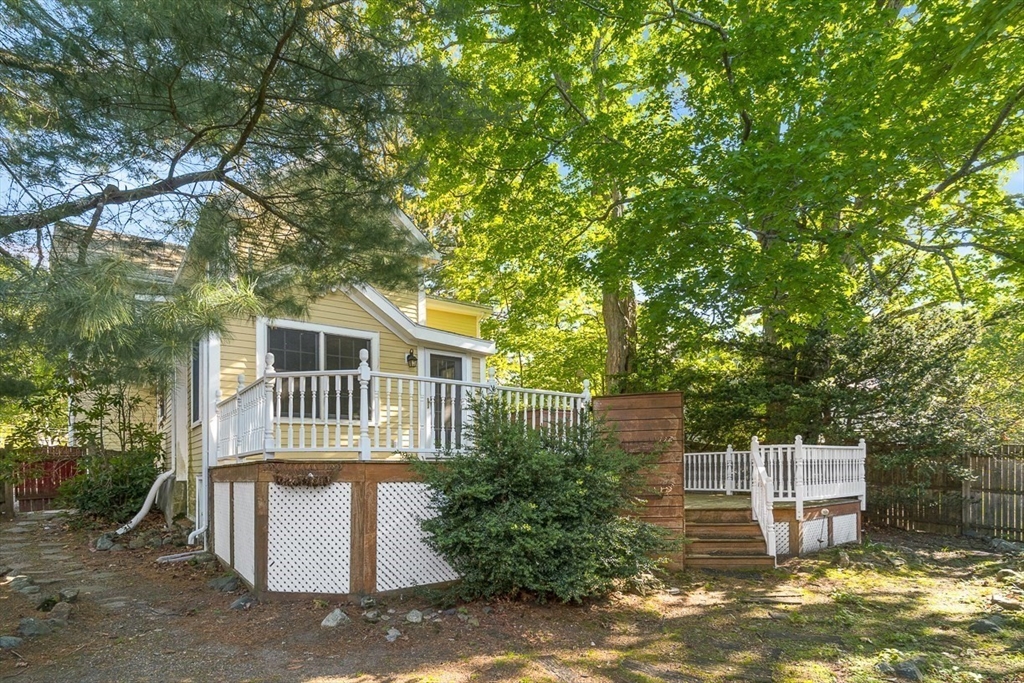 53 Lake Street Winchester, MA 01890 - Photo 30 of 36 a front view of a house with a yard