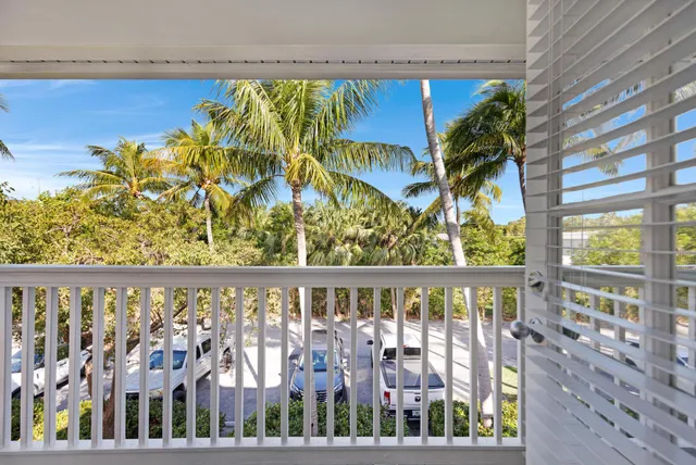 a view of balcony with furniture