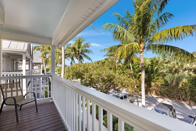 a view of a swimming pool with an outdoor space and seating area