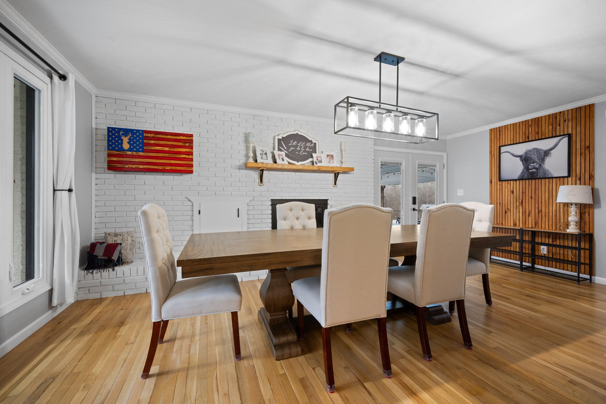 250 Pate Lane Dickson, TN 37055 - Photo 14 of 57 a view of a dining room with furniture wooden floor and a chandelier