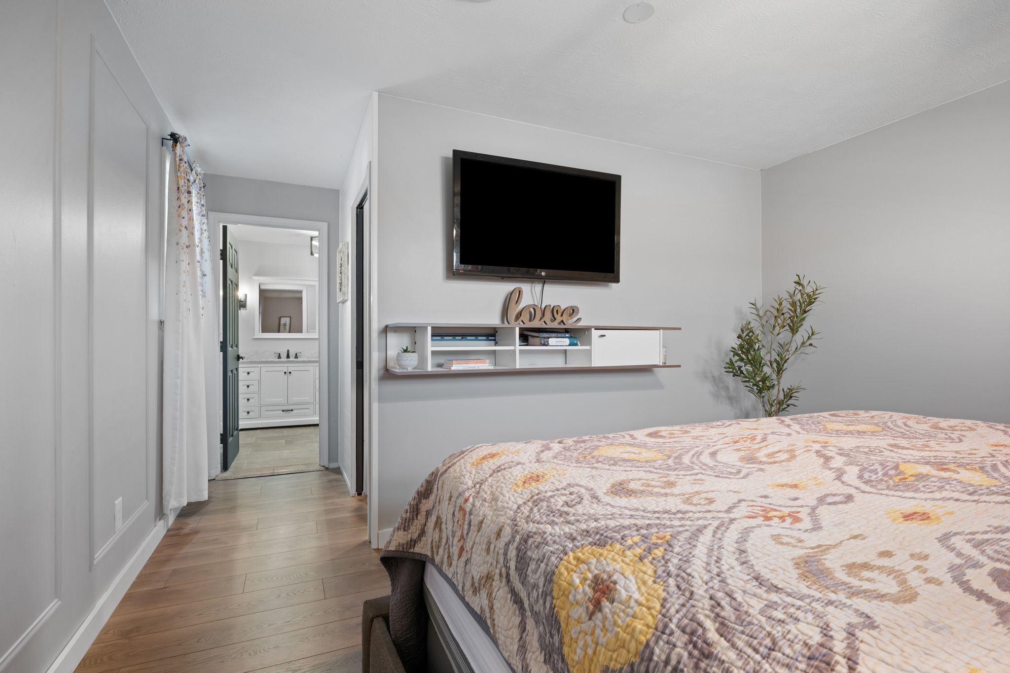 250 Pate Lane Dickson, TN 37055 - Photo 19 of 57 a bedroom with a bed and a flat screen tv