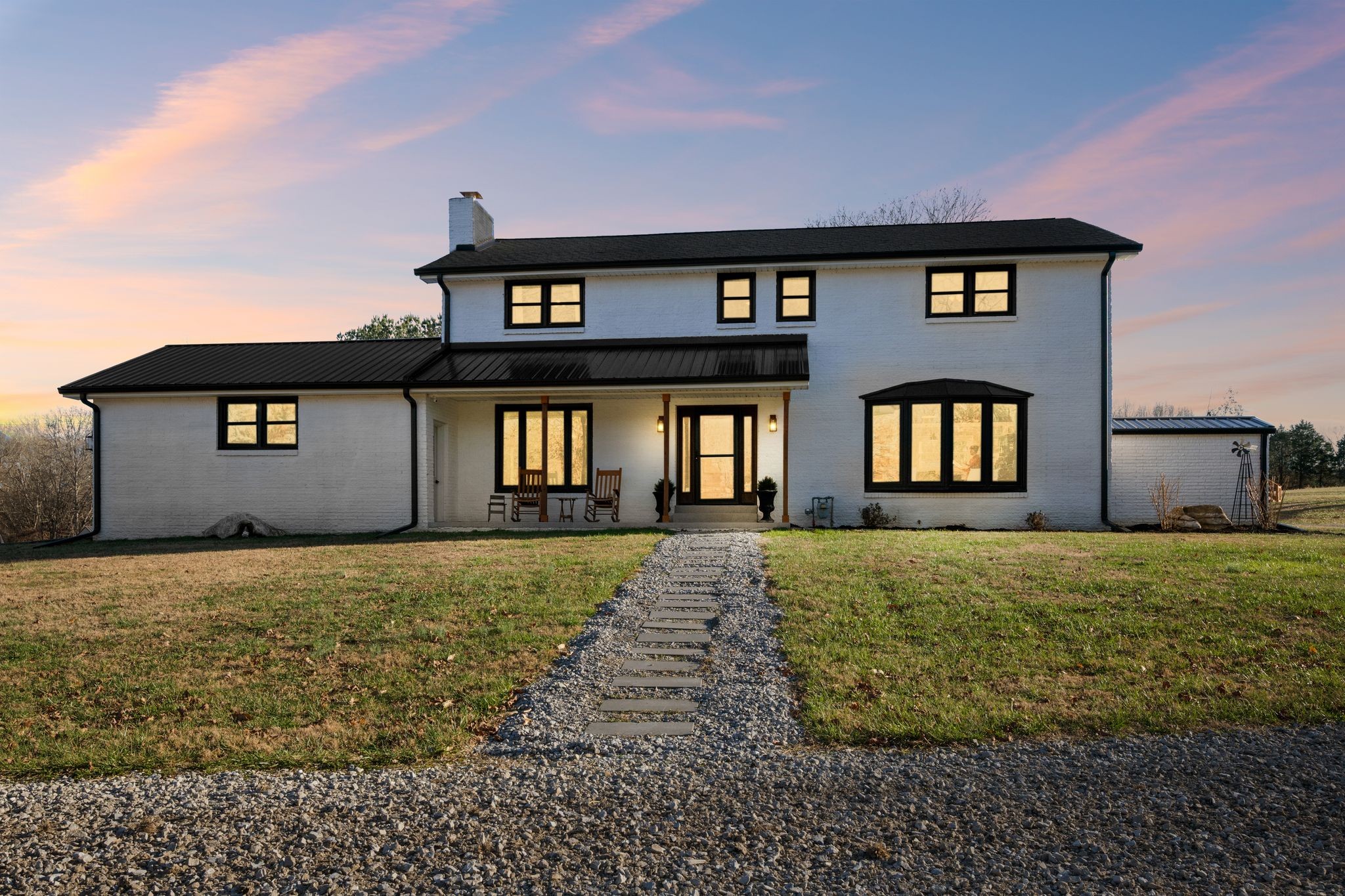 250 Pate Lane Dickson, TN 37055 - Photo 2 of 57 a front view of a house with garden