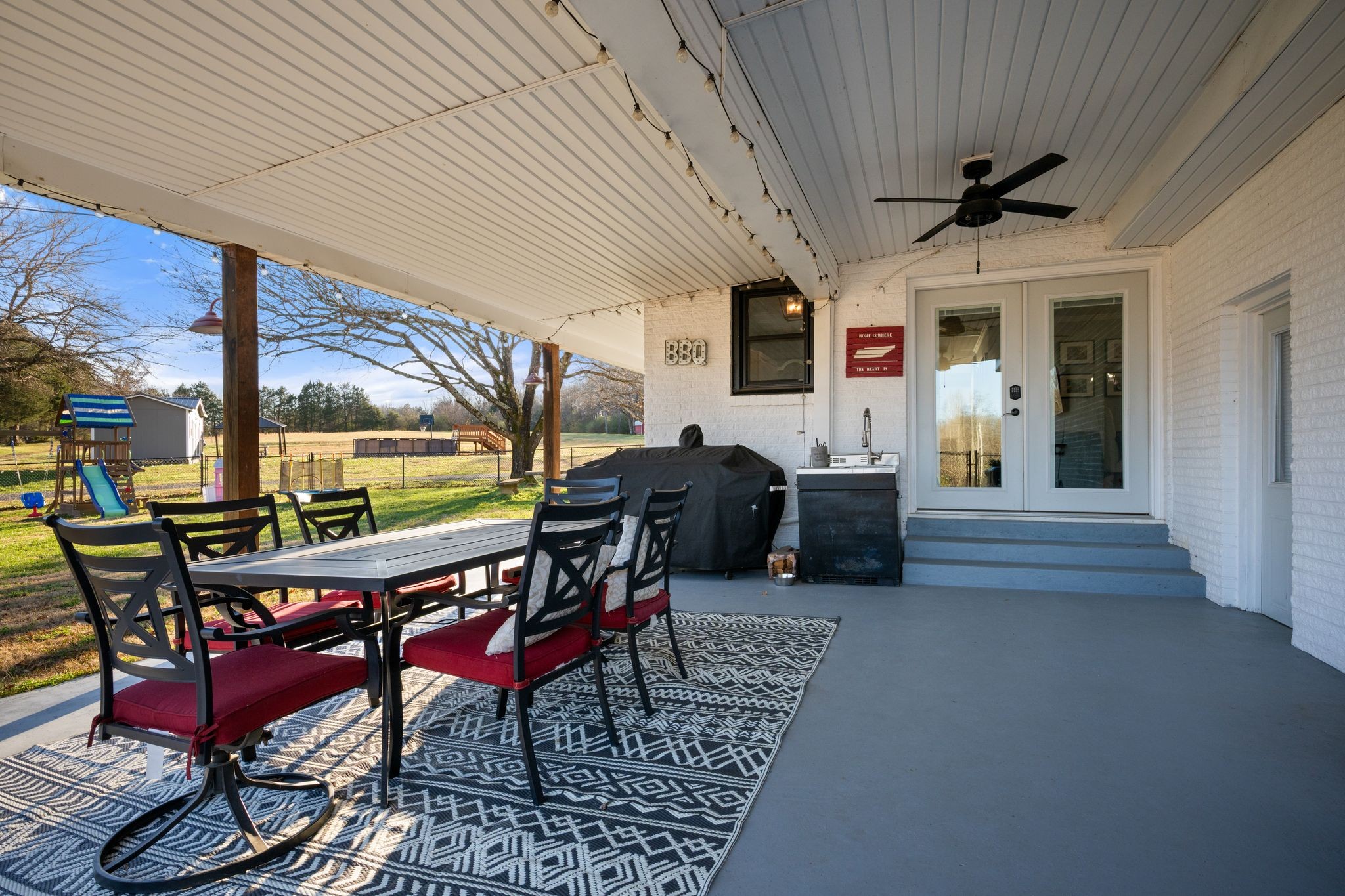 250 Pate Lane Dickson, TN 37055 - Photo 34 of 57 a view of a patio with table and chairs