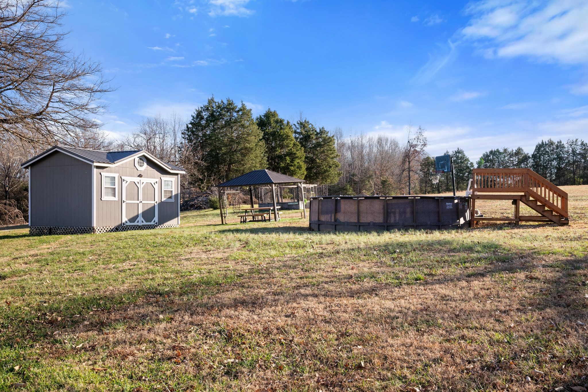 250 Pate Lane Dickson, TN 37055 - Photo 36 of 57 a house with trees in front of it
