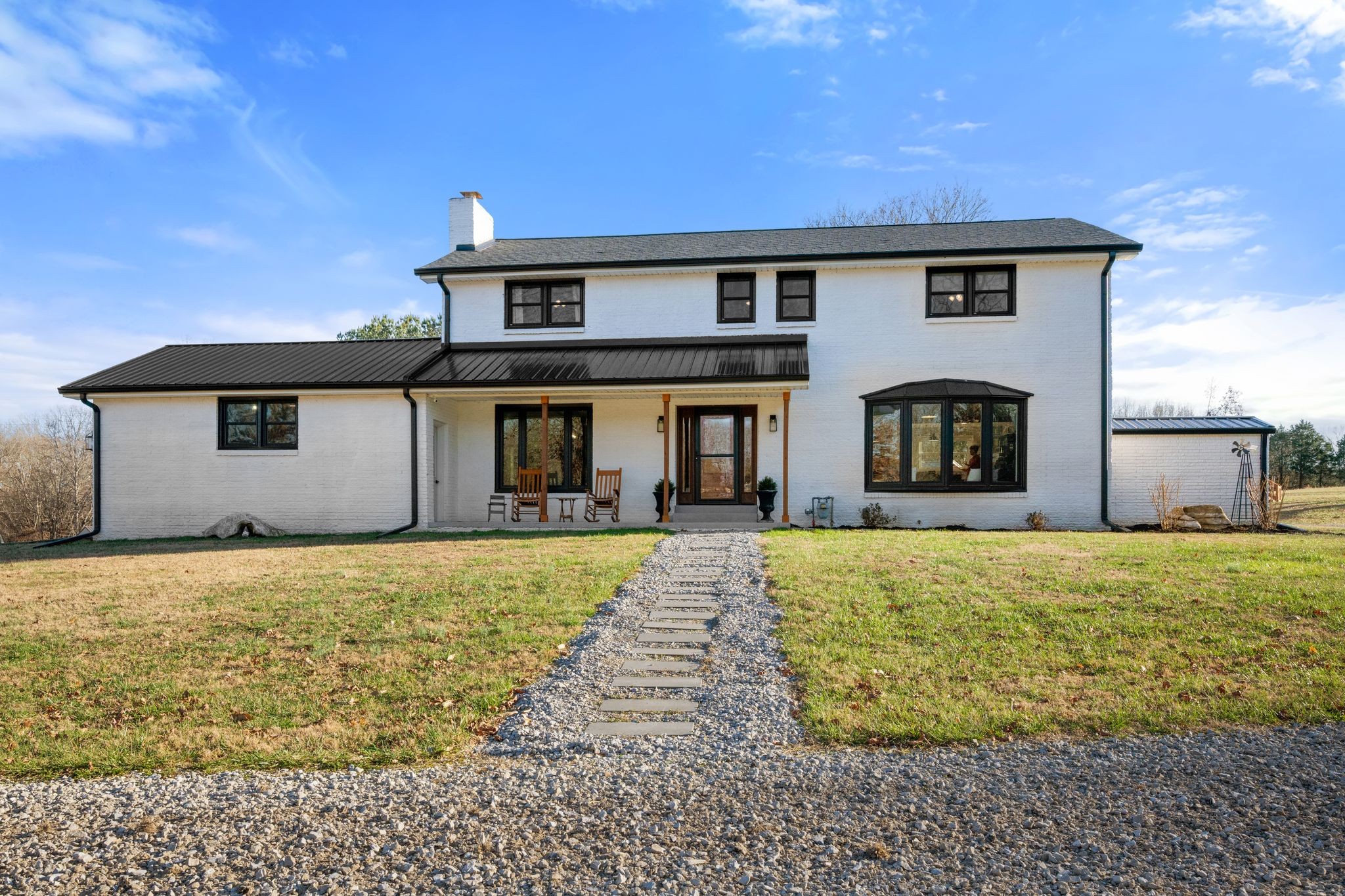 250 Pate Lane Dickson, TN 37055 - Photo 39 of 57 a front view of a house with garden