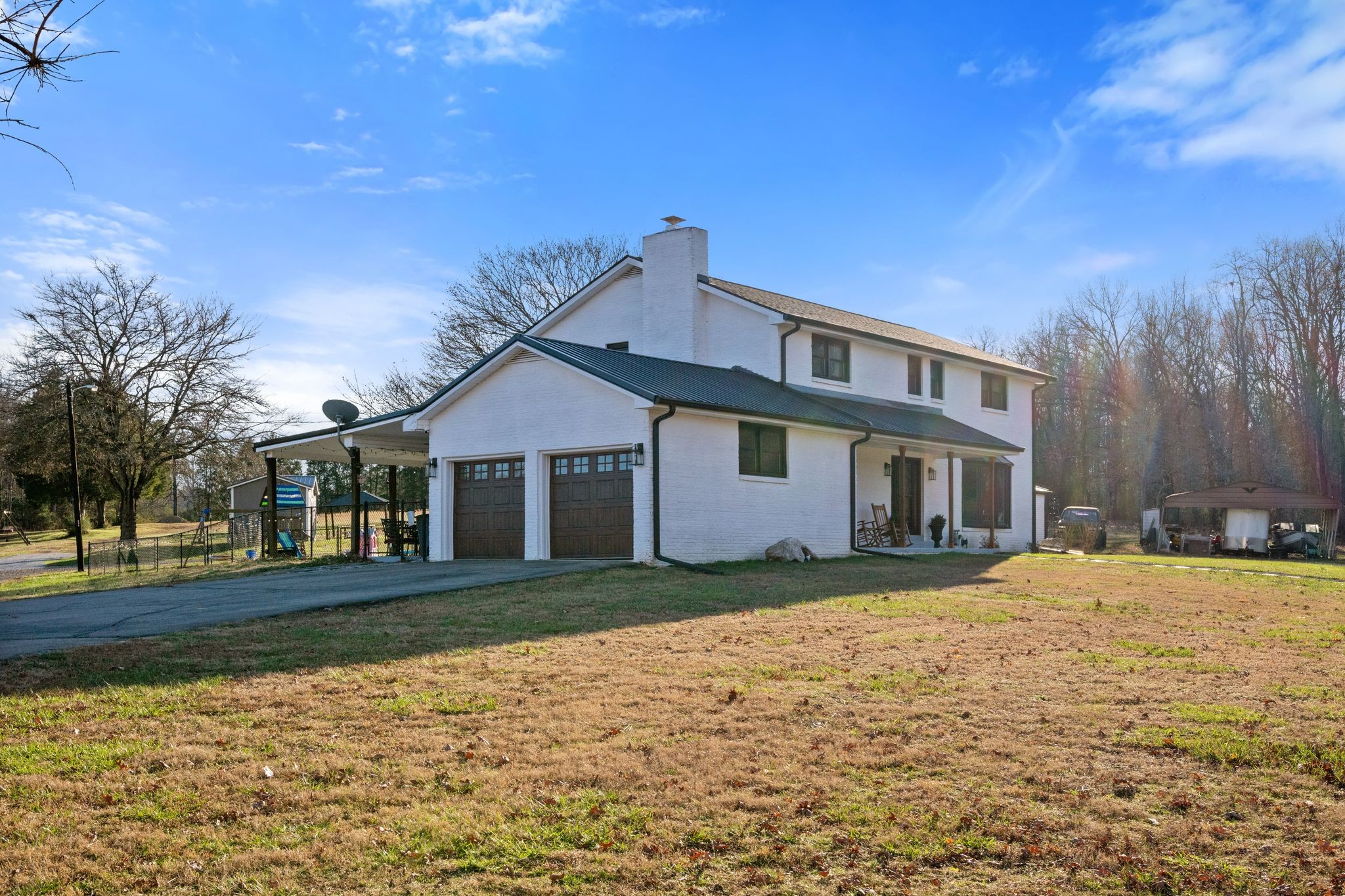 250 Pate Lane Dickson, TN 37055 - Photo 42 of 57 a front view of a house with a yard