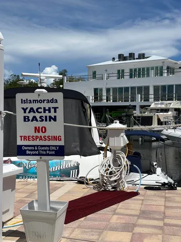 a view of a lake with outdoor seating space