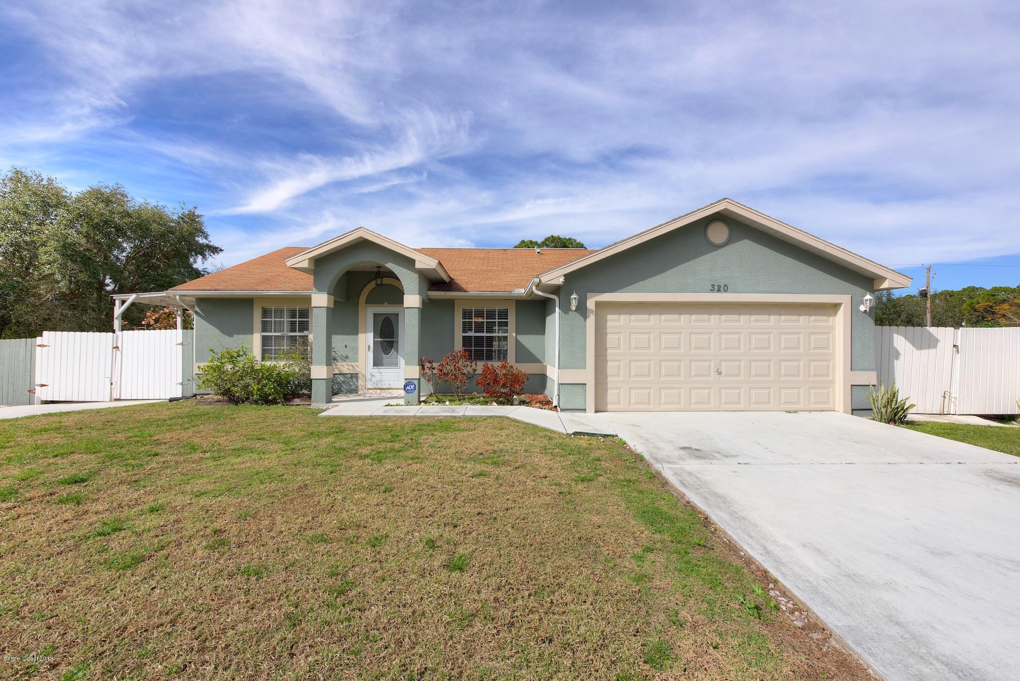 320 Wendover Road Southwest Palm Bay, FL 32908 - Photo 1 of 21 Front