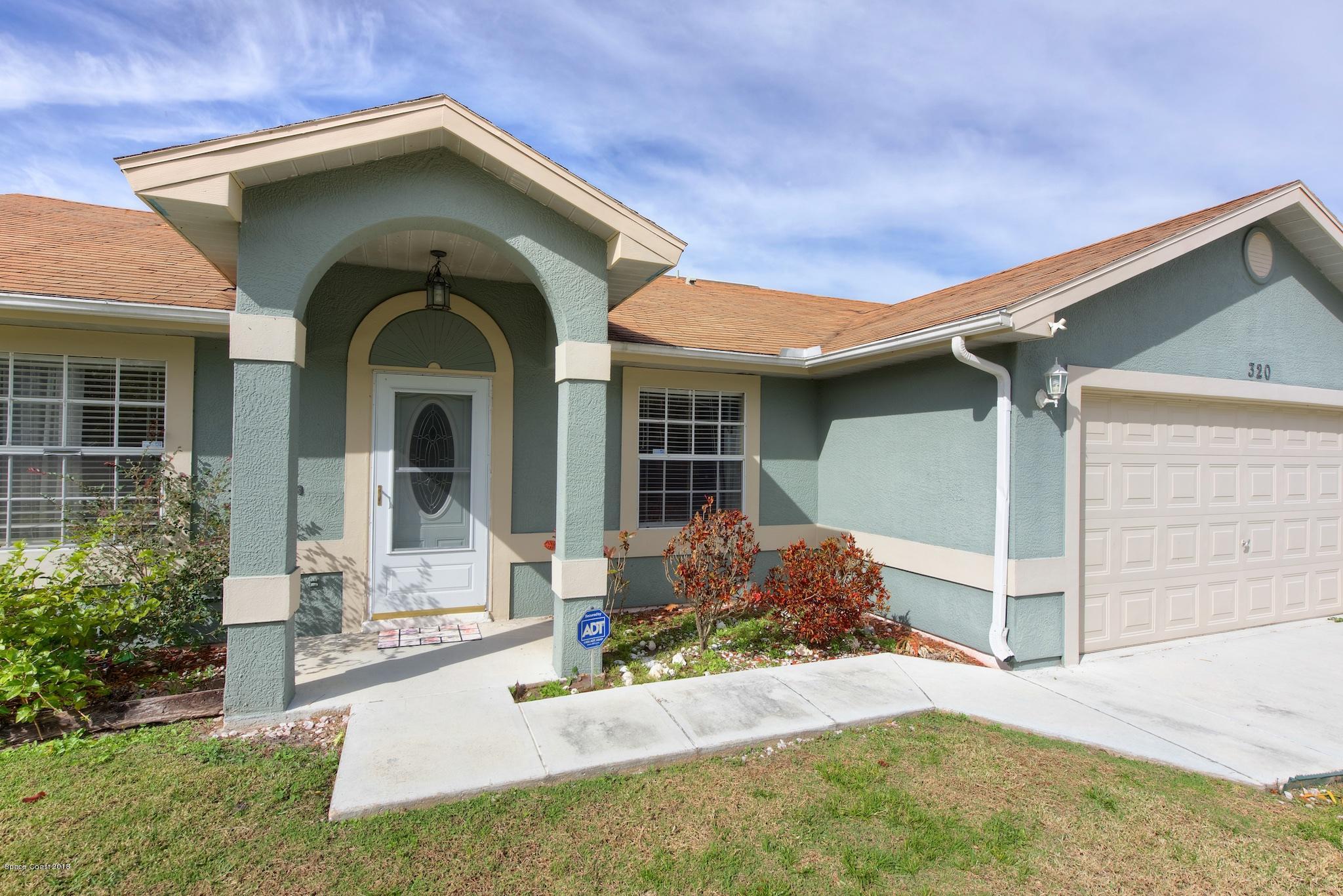 320 Wendover Road Southwest Palm Bay, FL 32908 - Photo 2 of 21 Front Close