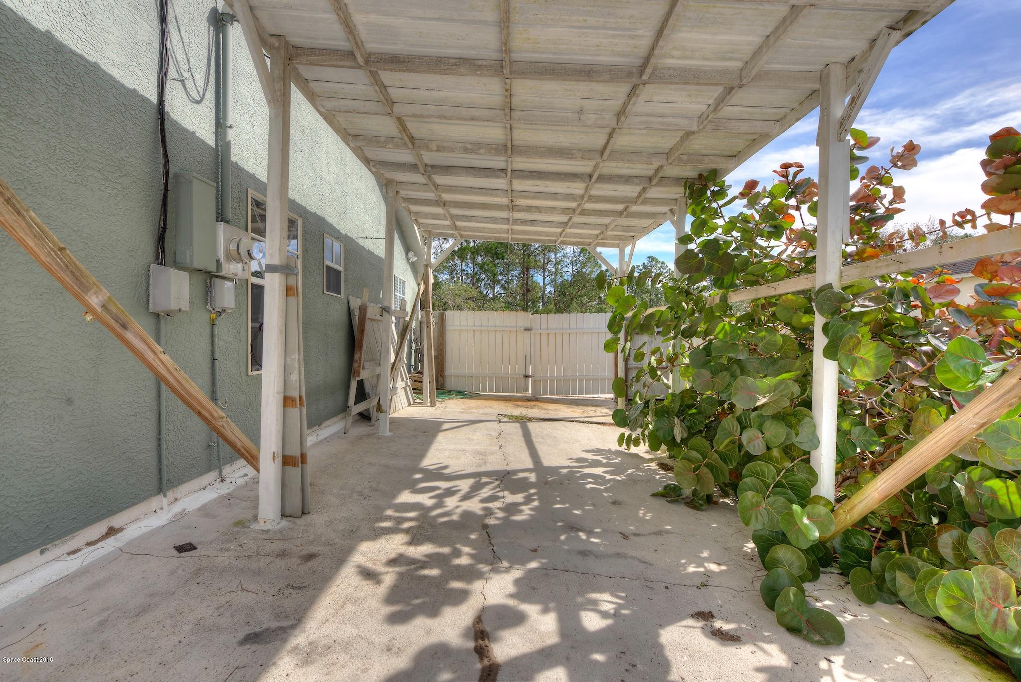 320 Wendover Road Southwest Palm Bay, FL 32908 - Photo 20 of 21 Side Porch