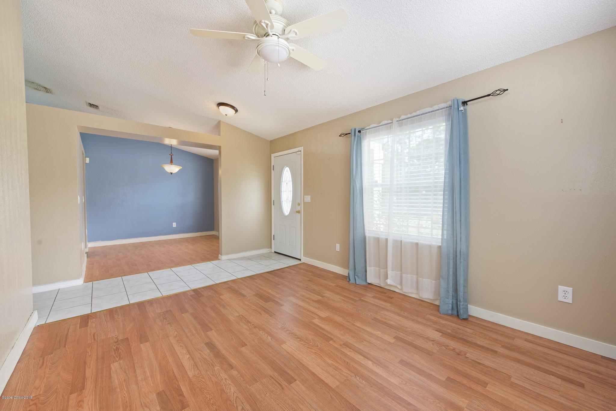 320 Wendover Road Southwest Palm Bay, FL 32908 - Photo 5 of 21 Formal Living Room