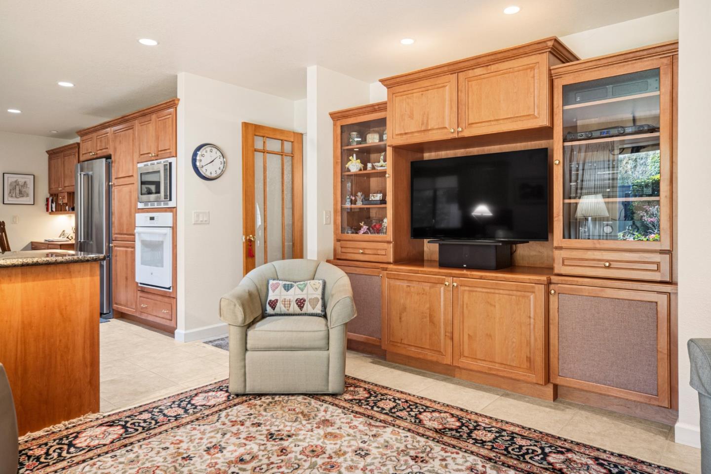 2911 Colton Road Pebble Beach, CA 93953 - Photo 16 of 46 a living room with furniture and a flat screen tv