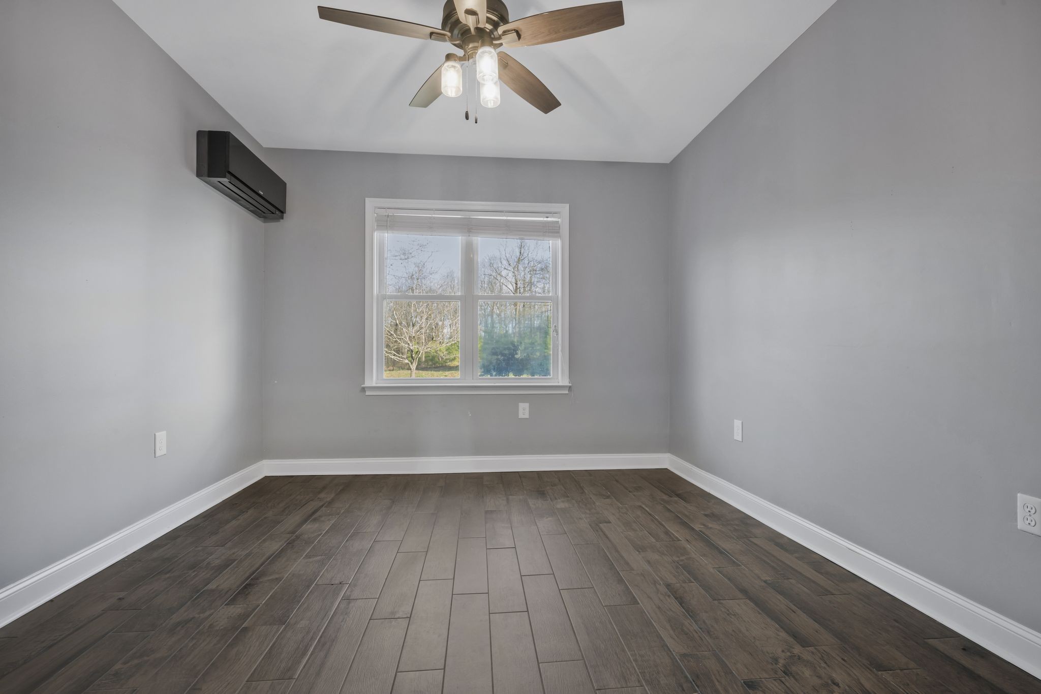 1053 Hall Cemetery Road Burns, TN 37029 - Photo 18 of 64 wooden floor in an empty room with a window