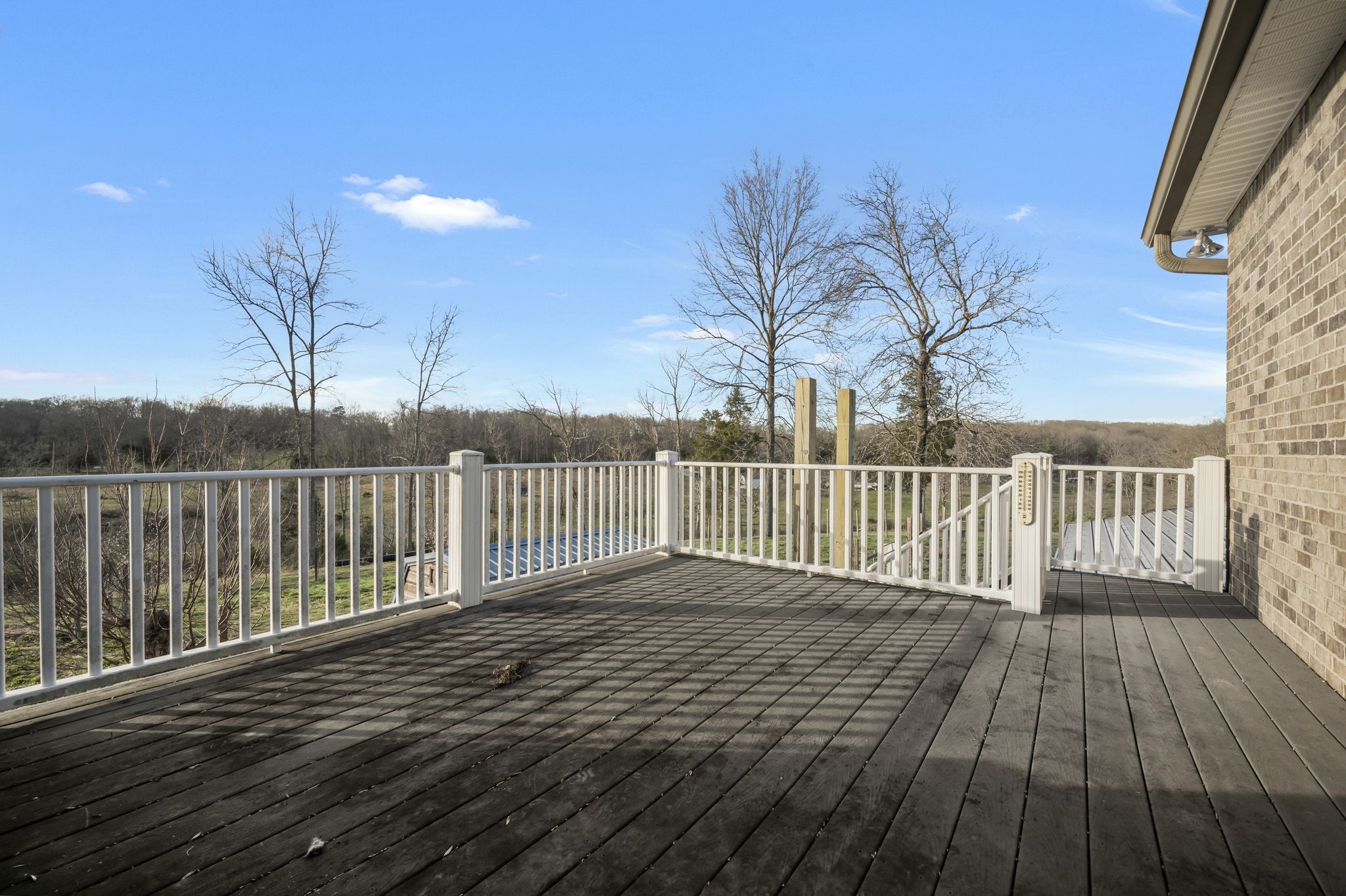 1053 Hall Cemetery Road Burns, TN 37029 - Photo 31 of 64 a view of a balcony with wooden floor