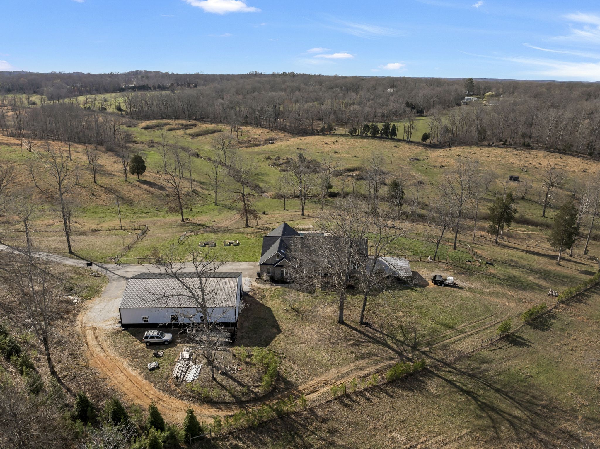 1053 Hall Cemetery Road Burns, TN 37029 - Photo 40 of 64 an aerial view of a houses with a yard