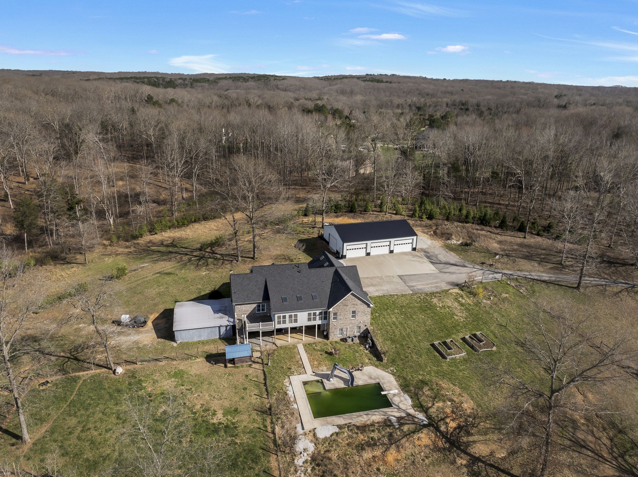 1053 Hall Cemetery Road Burns, TN 37029 - Photo 42 of 64 an aerial view of a house with a yard