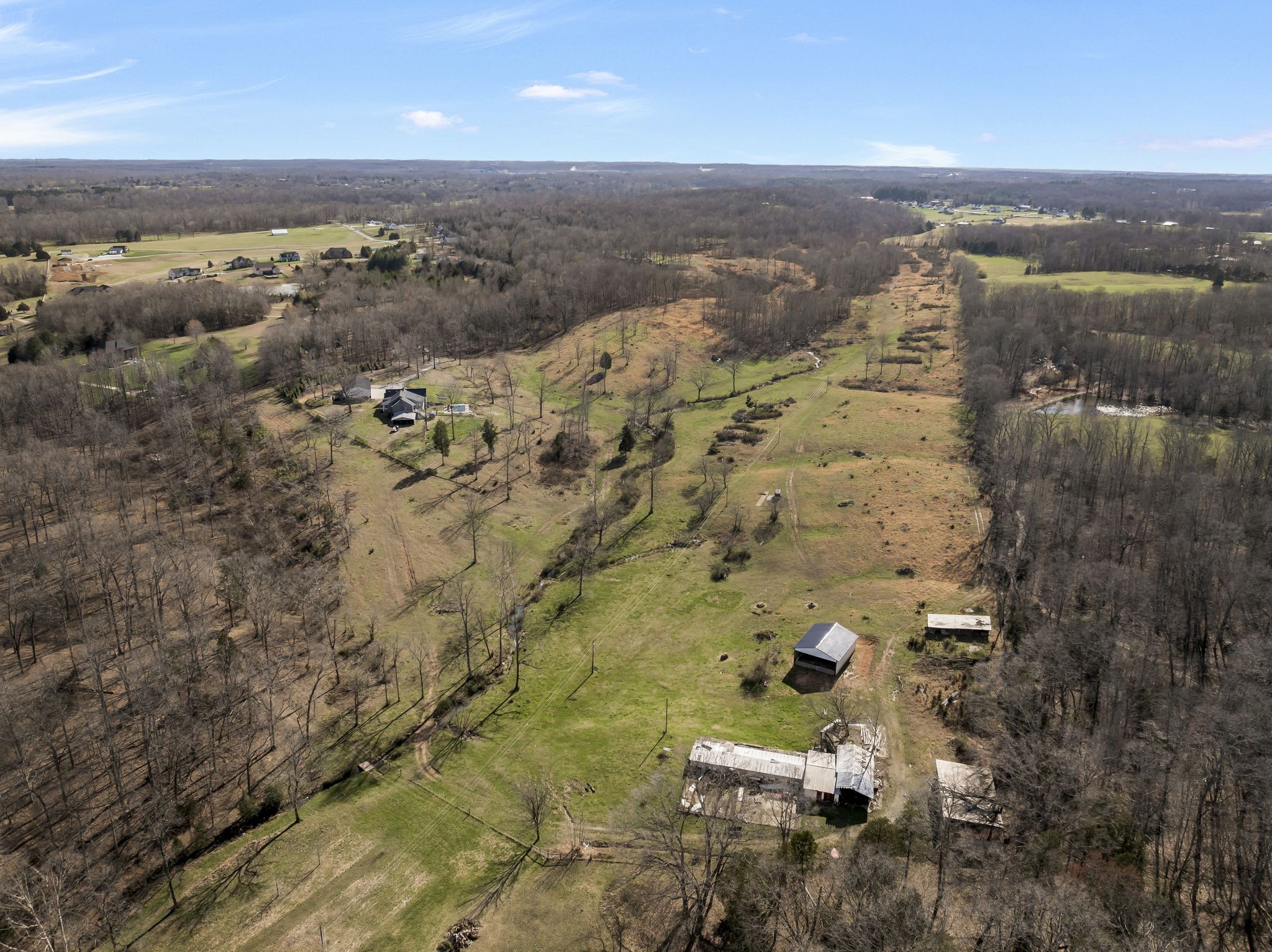 1053 Hall Cemetery Road Burns, TN 37029 - Photo 48 of 64 an aerial view of a house with a lake view