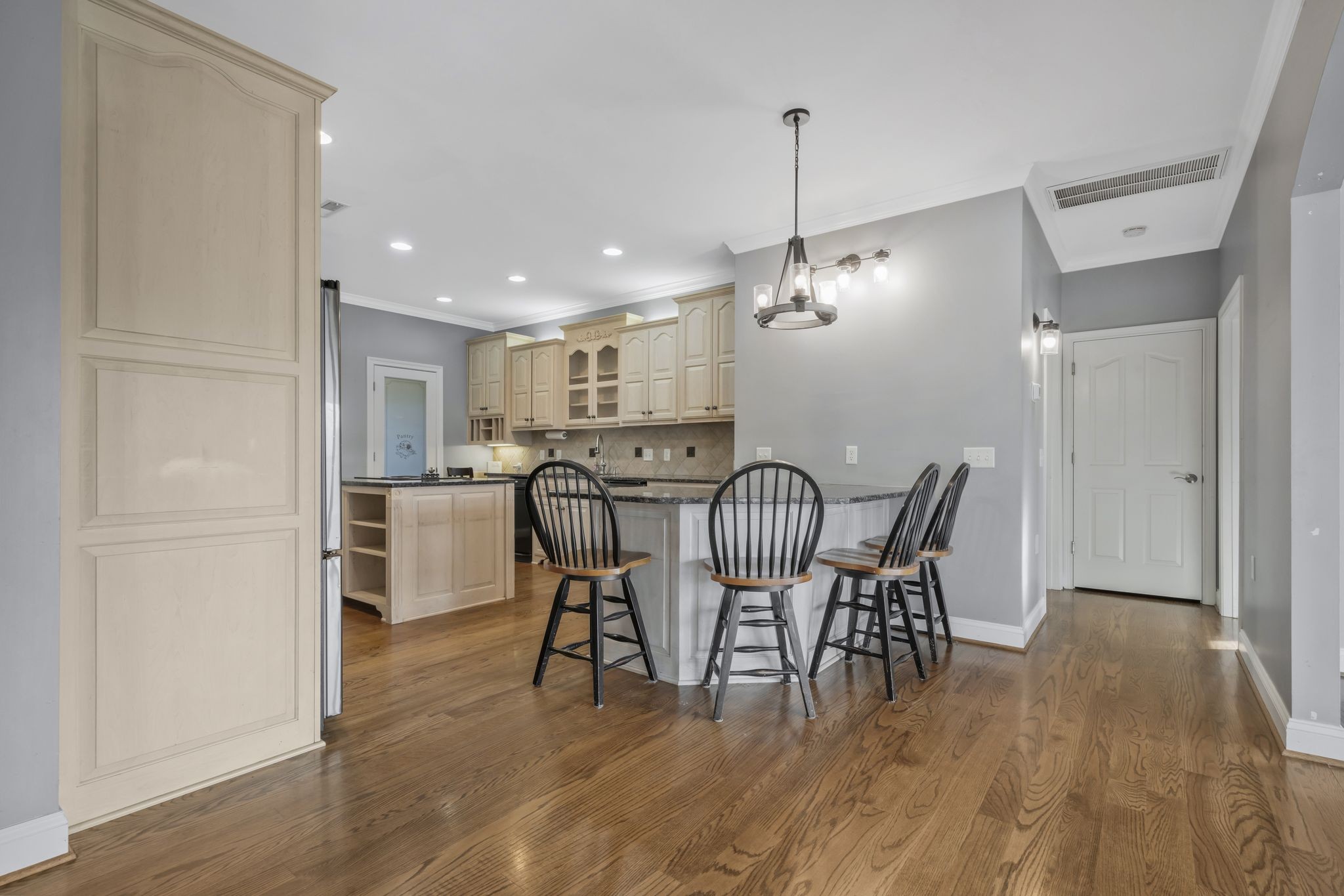 1053 Hall Cemetery Road Burns, TN 37029 - Photo 9 of 64 a view of a dining room with furniture and wooden floor