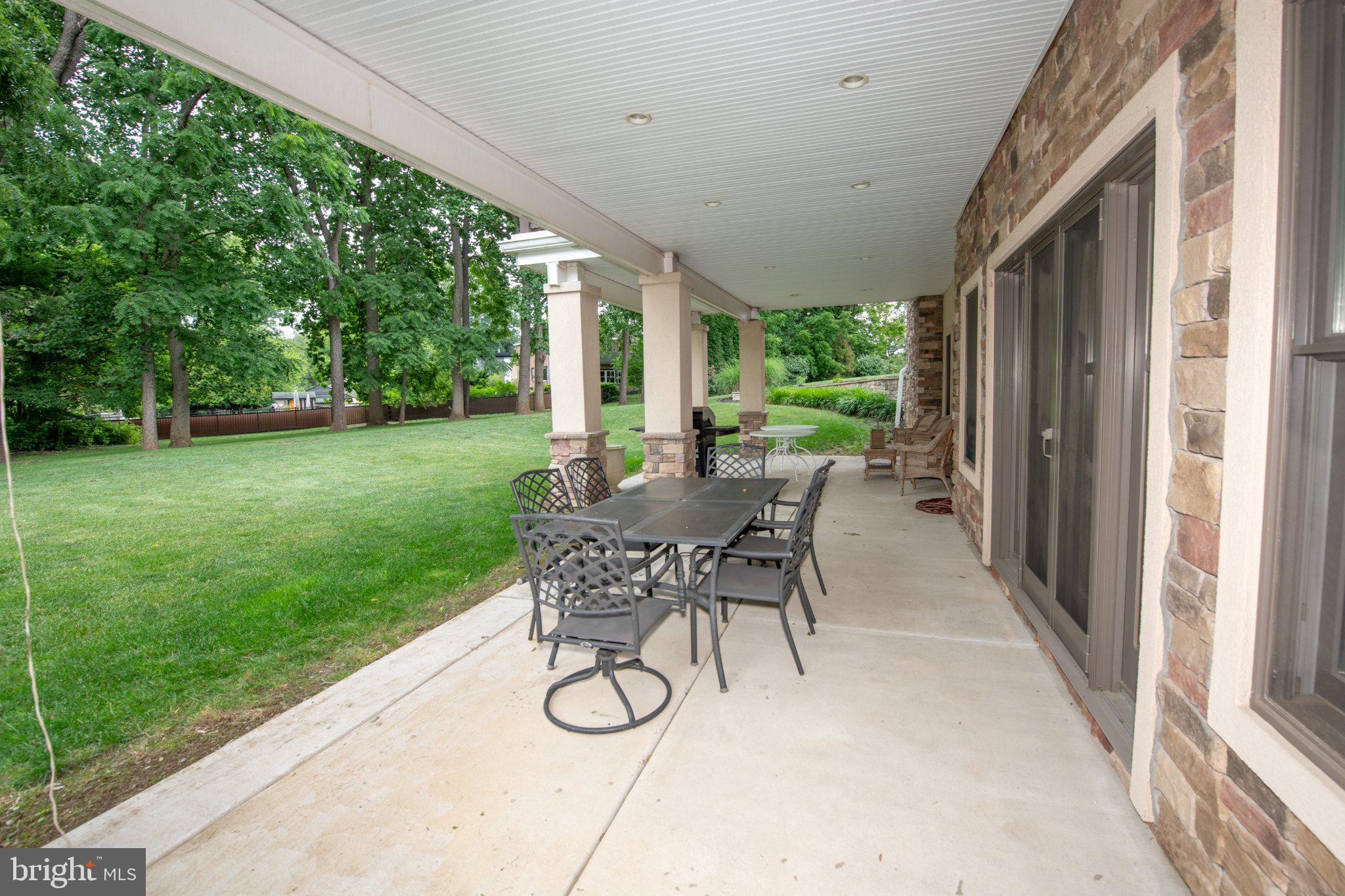 711 Moredon Road Jenkintown, PA 19046 - Photo 23 of 140 Serene patio with lush greenery.