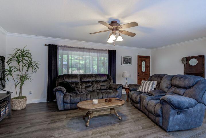 37105 Sapphire Road Burney, CA 96013 - Photo 8 of 39 a living room with furniture and a large window