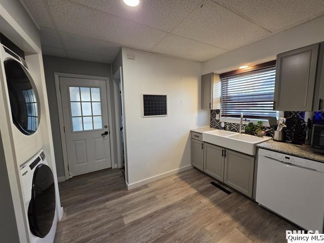 1431 Spruce Street Quincy, IL 62301 - Photo 11 of 36 a kitchen with granite countertop a sink a washer and dryer