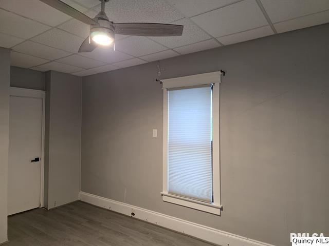 1431 Spruce Street Quincy, IL 62301 - Photo 16 of 36 an empty room with wooden floor and closet