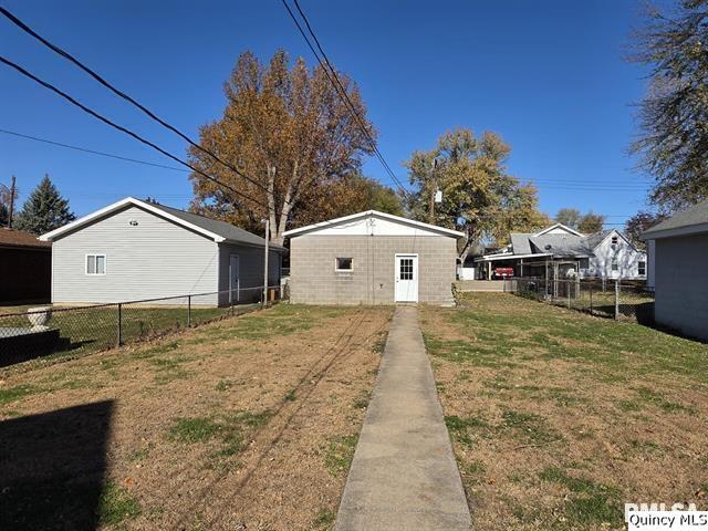 1431 Spruce Street Quincy, IL 62301 - Photo 30 of 36 a house view with a backyard space