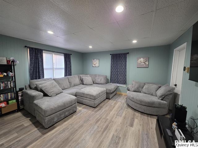 1431 Spruce Street Quincy, IL 62301 - Photo 3 of 36 a living room with furniture and a wooden floor