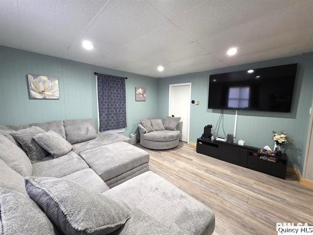 1431 Spruce Street Quincy, IL 62301 - Photo 4 of 36 a bedroom with a bed and a view of kitchen