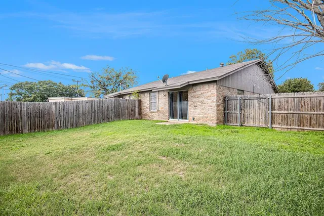 a view of a backyard with a garden
