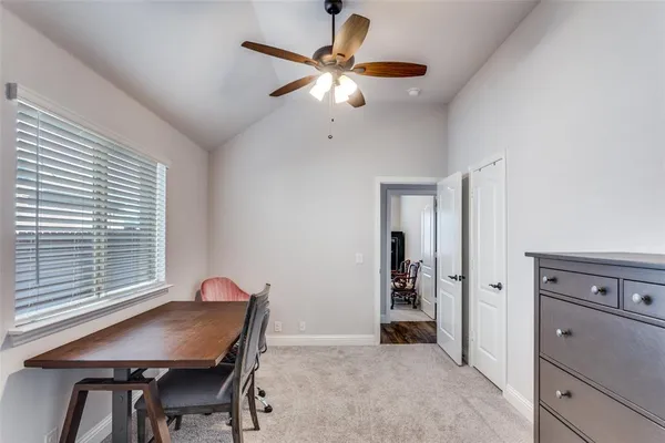 a workspace with furniture and window