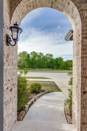 a view of a terrace with a yard