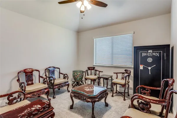 a living room with furniture and window