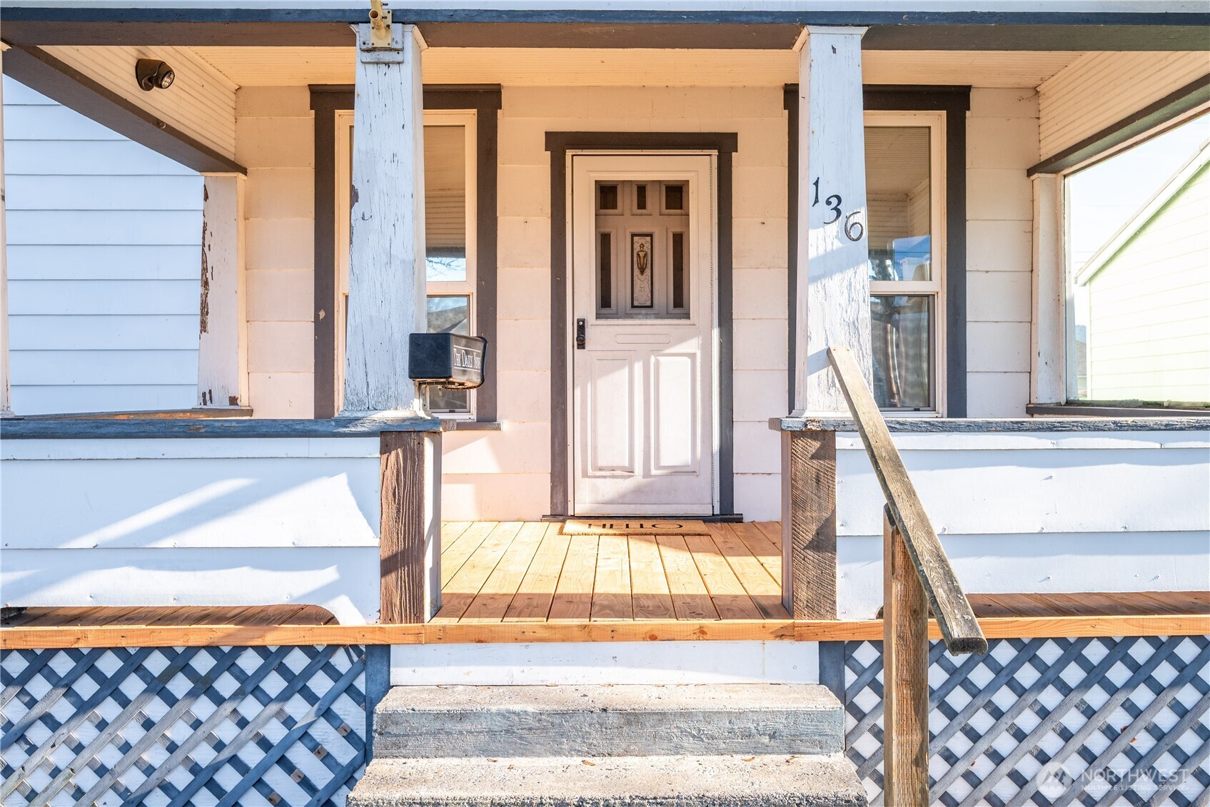 136 3rd Avenue Southwest Castle Rock, WA 98611 - Photo 2 of 40 a front view of a house with a yard