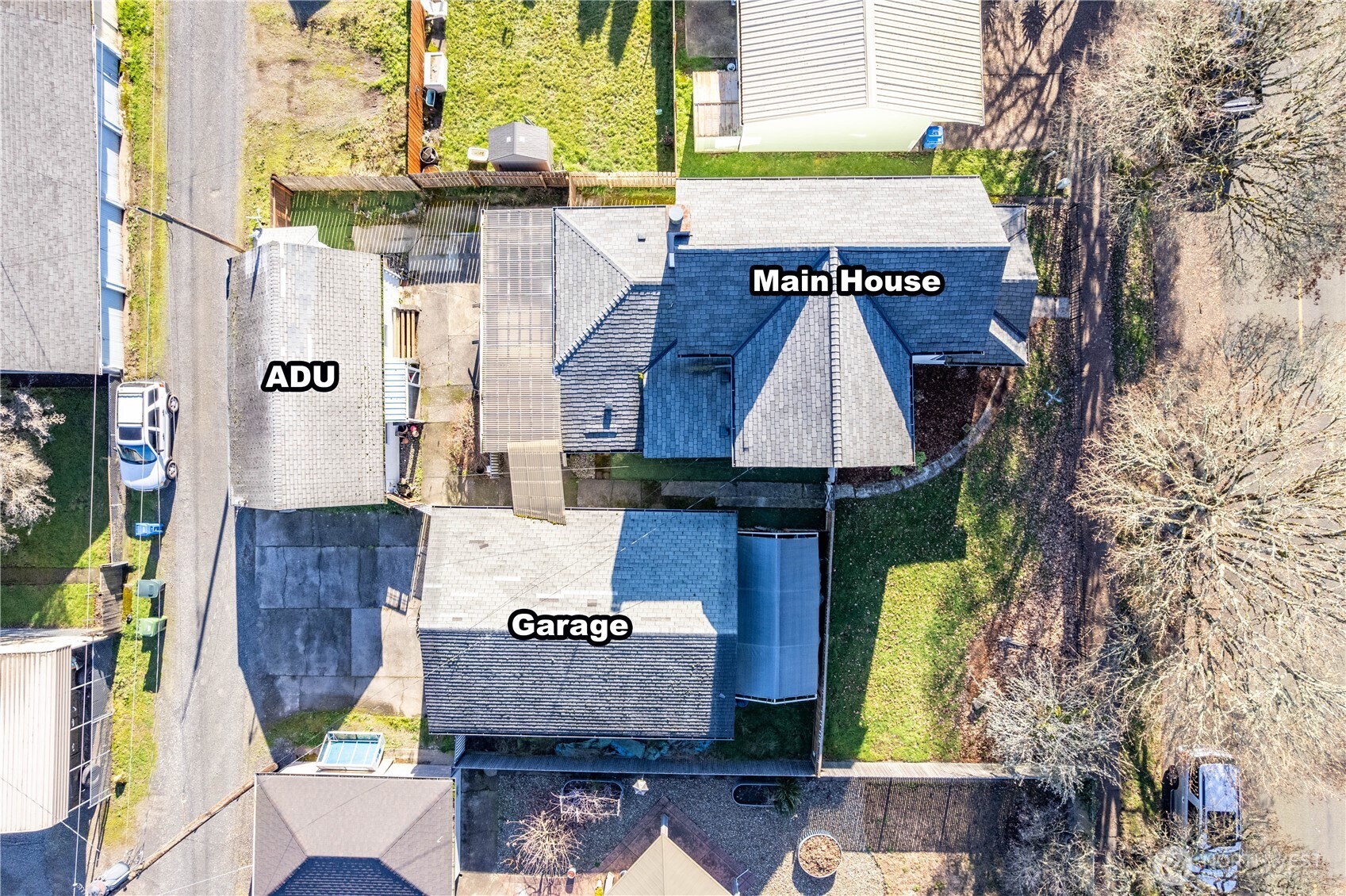 136 3rd Avenue Southwest Castle Rock, WA 98611 - Photo 29 of 40 a aerial view of a house with table and chairs