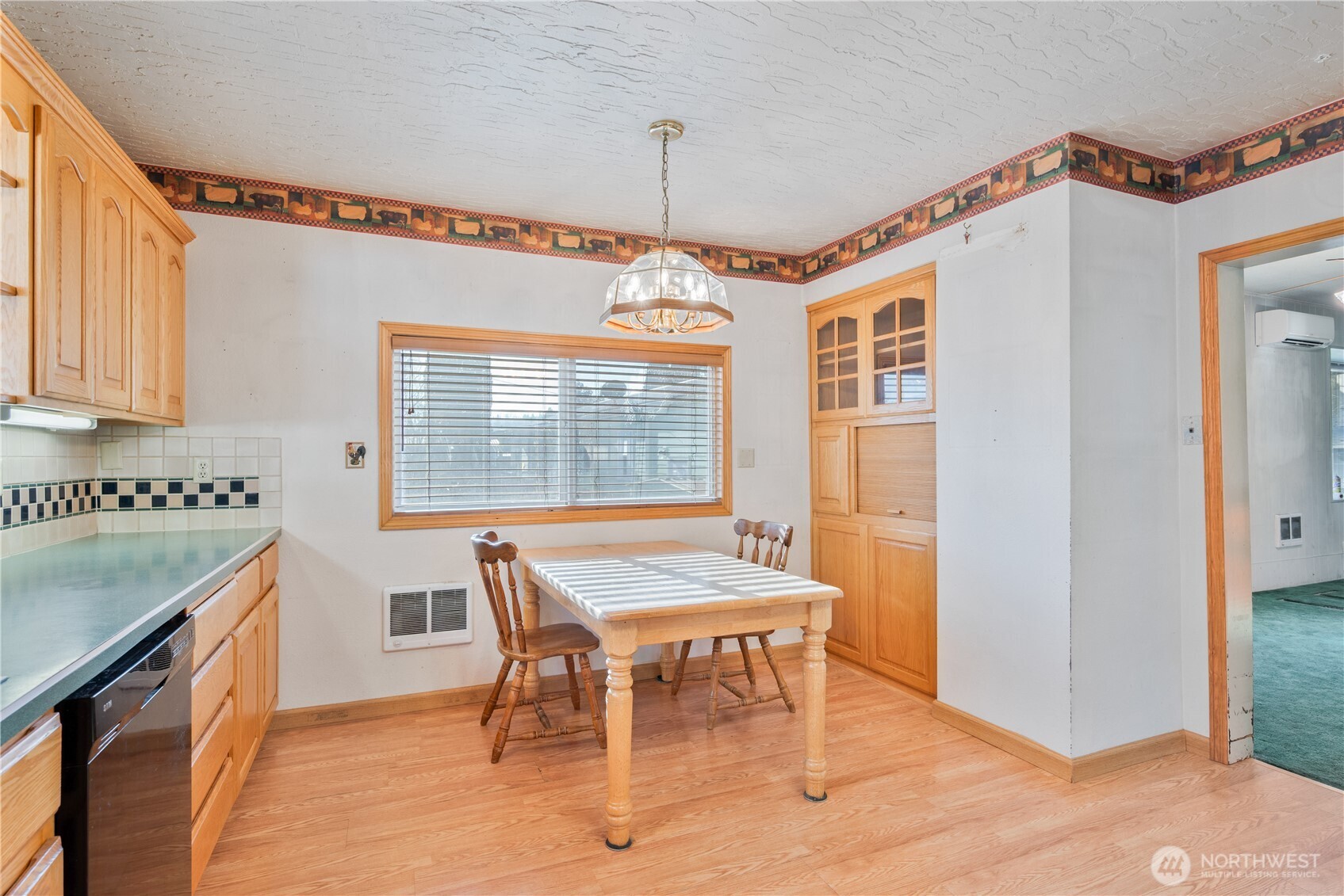 136 3rd Avenue Southwest Castle Rock, WA 98611 - Photo 7 of 40 a view of a dining room with furniture and window