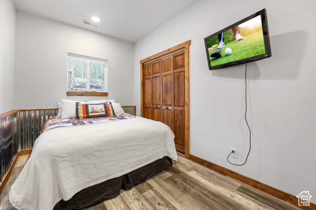 2029 West Tollgate Road Coalville, UT 84017 - Photo 25 of 43 Bedroom with wood finished floors and a closet