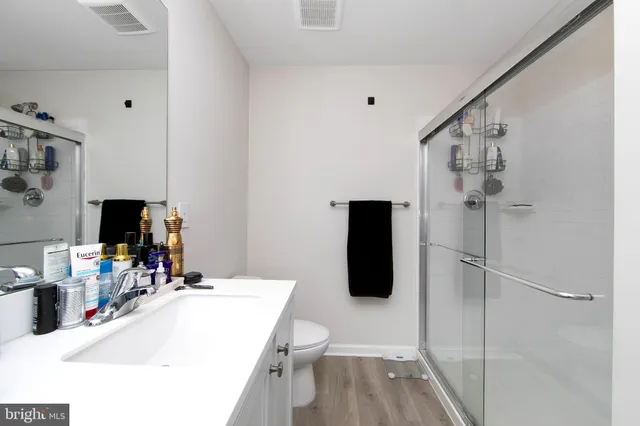 a kitchen with a sink cabinets and window