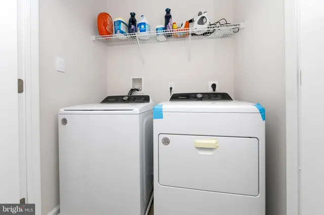 a front view of a building with many windows