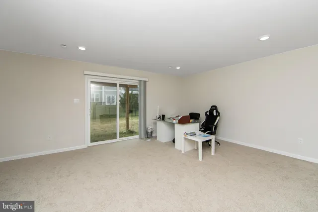 a view of a room with a table and chair