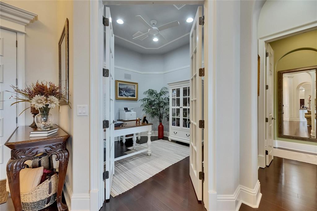 624 Balibay Road Apollo Beach, FL 33572 - Photo 42 of 99 a view of a hallway with workspace and living room