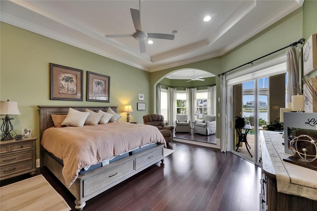 624 Balibay Road Apollo Beach, FL 33572 - Photo 49 of 99 a bedroom with a large bed and a large window