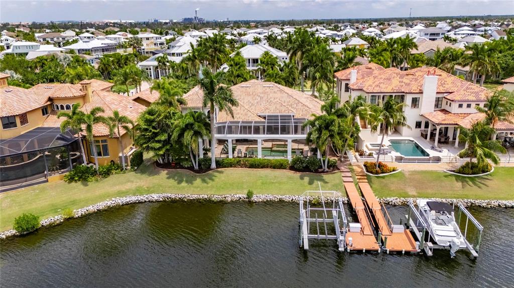 624 Balibay Road Apollo Beach, FL 33572 - Photo 6 of 99 an aerial view of residential houses with outdoor space and swimming pool