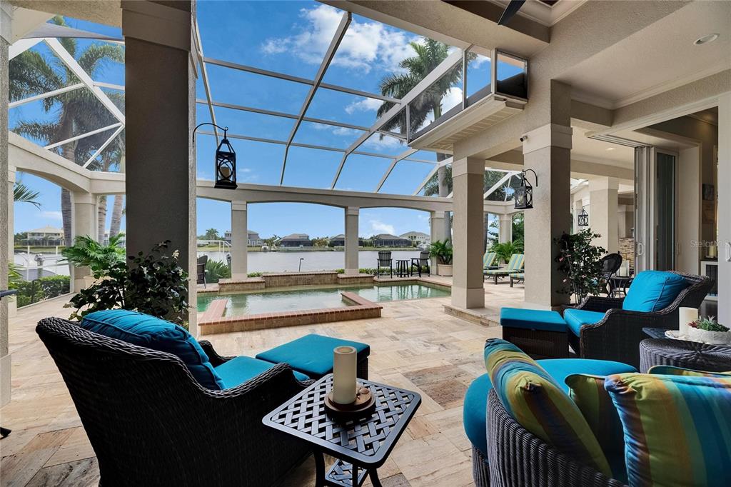 624 Balibay Road Apollo Beach, FL 33572 - Photo 79 of 99 a outdoor living space with furniture and a floor to ceiling window