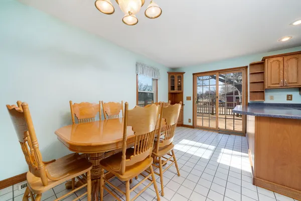 a kitchen with stainless steel appliances granite countertop a refrigerator sink and cabinets