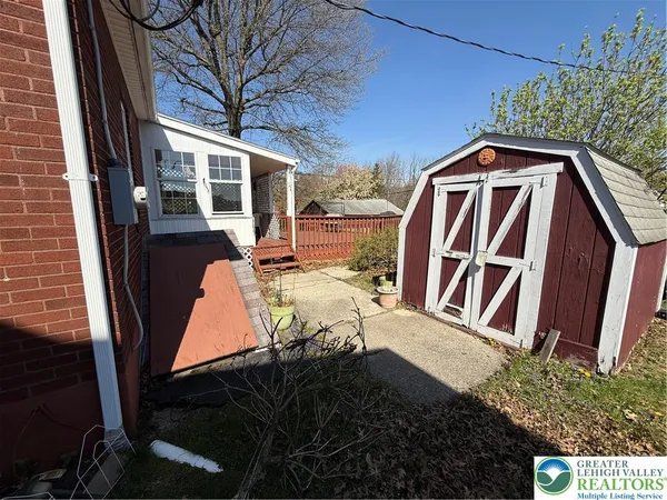 a front view of a house with a garage