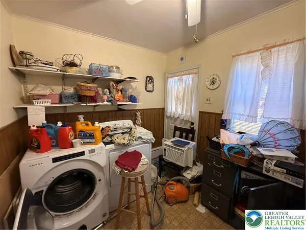 a room with a storage and utility