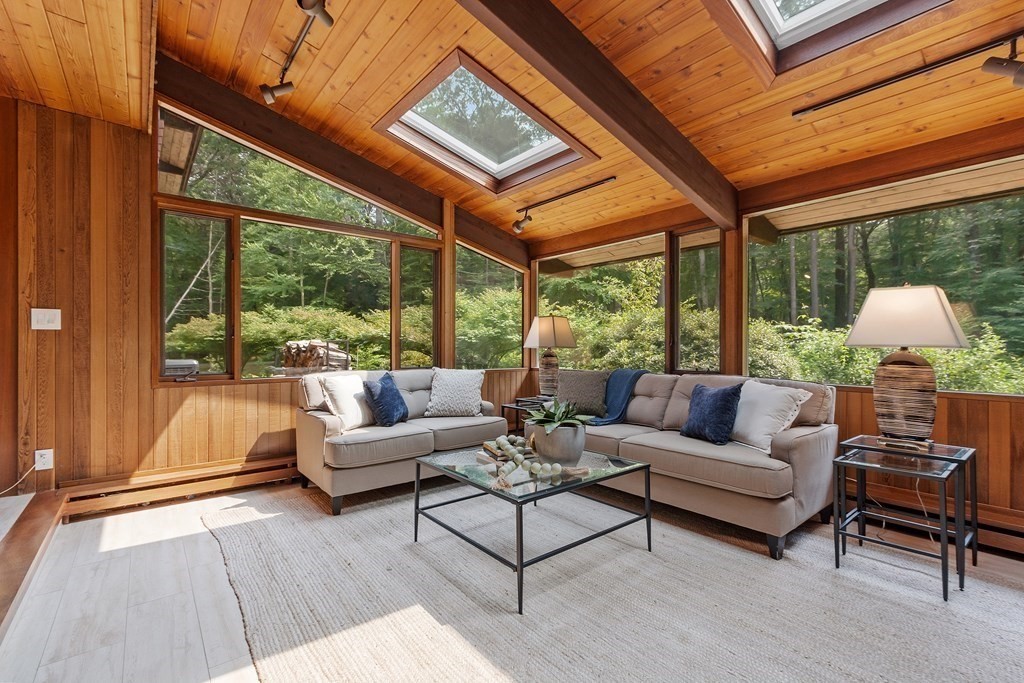 237 Stoney Gate Carlisle, MA 01741 - Photo 28 of 35 a living room with furniture and a large window