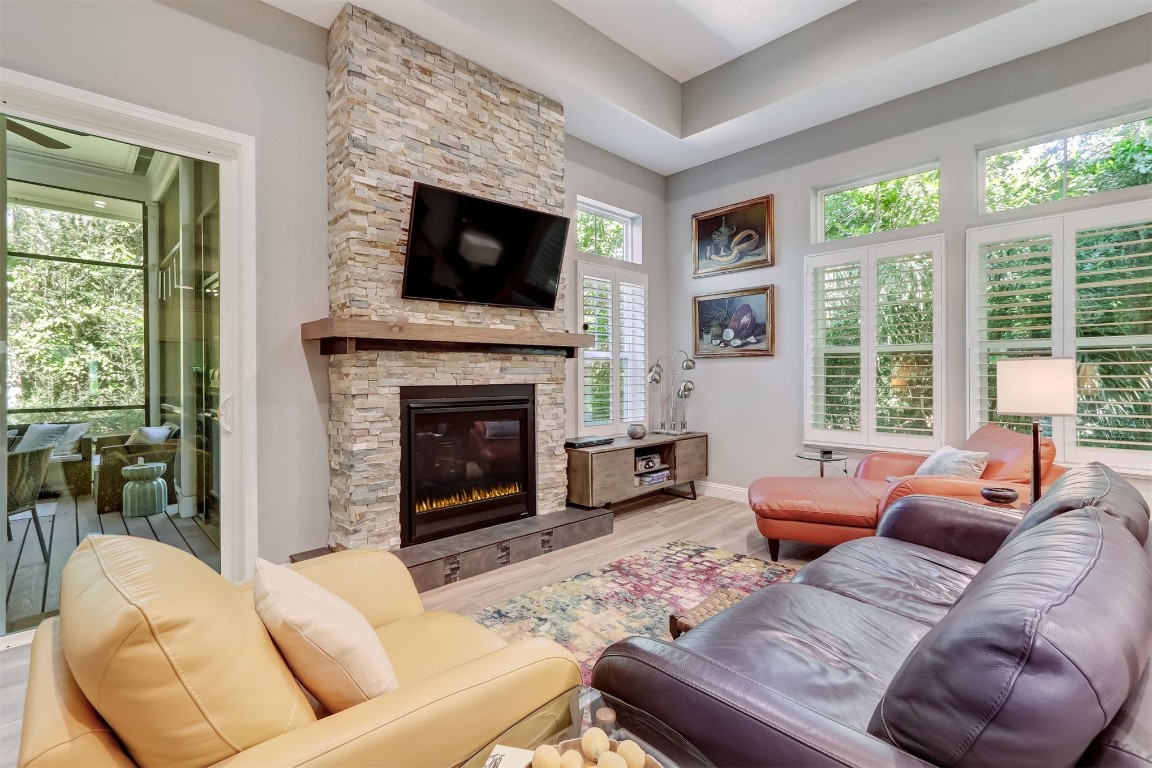 2629 Racheal Avenue Fernandina Beach, FL 32034 - Photo 14 of 53 a living room with furniture large window and a fireplace
